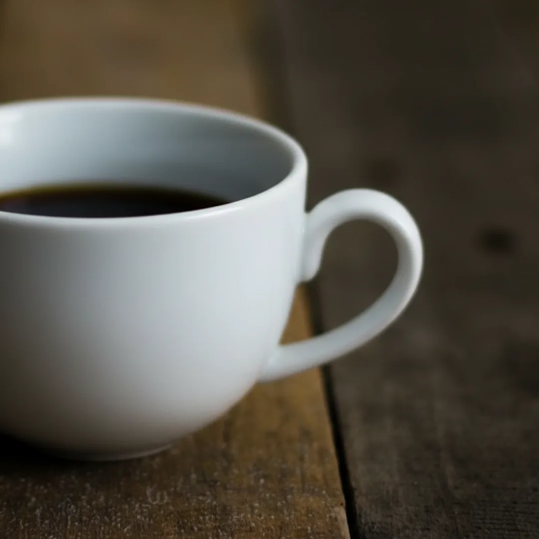 AI-generated macro detail of a white ceramic mug